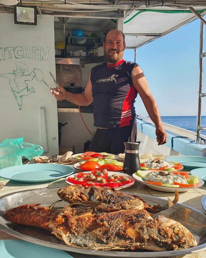 Captain cooking on deck